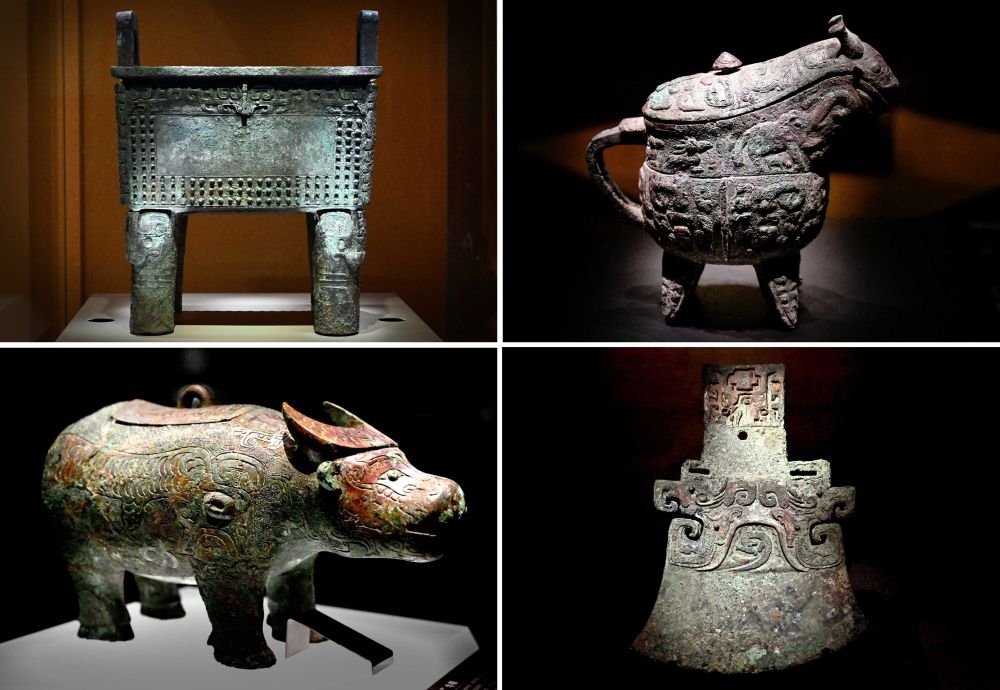 這是殷墟博物館新館內(nèi)展出的“司母辛”銅鼎（左上）、“亞長”銅觥（右上）、“亞長”牛尊（左下）、“亞長”銅鉞（拼版照片，2月23日攝）。