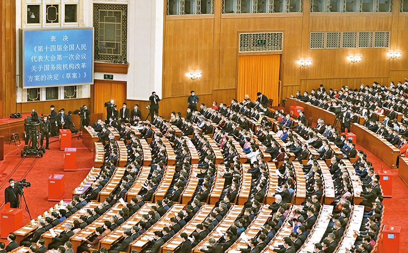 2023年3月10日，十四屆全國人大一次會議在北京人民大會堂舉行第三次全體會議，表決通過了關(guān)于國務(wù)院機構(gòu)改革方案的決定。圖為會議現(xiàn)場。 新華社記者 岳月偉/攝
