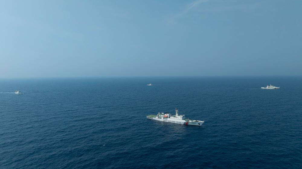 4月22日，中越海警艦艇編隊在北部灣海域開展聯(lián)合巡邏。（中國海警供圖）